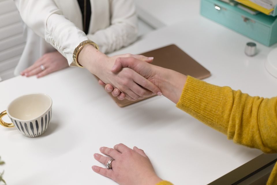 Business agreement handshake